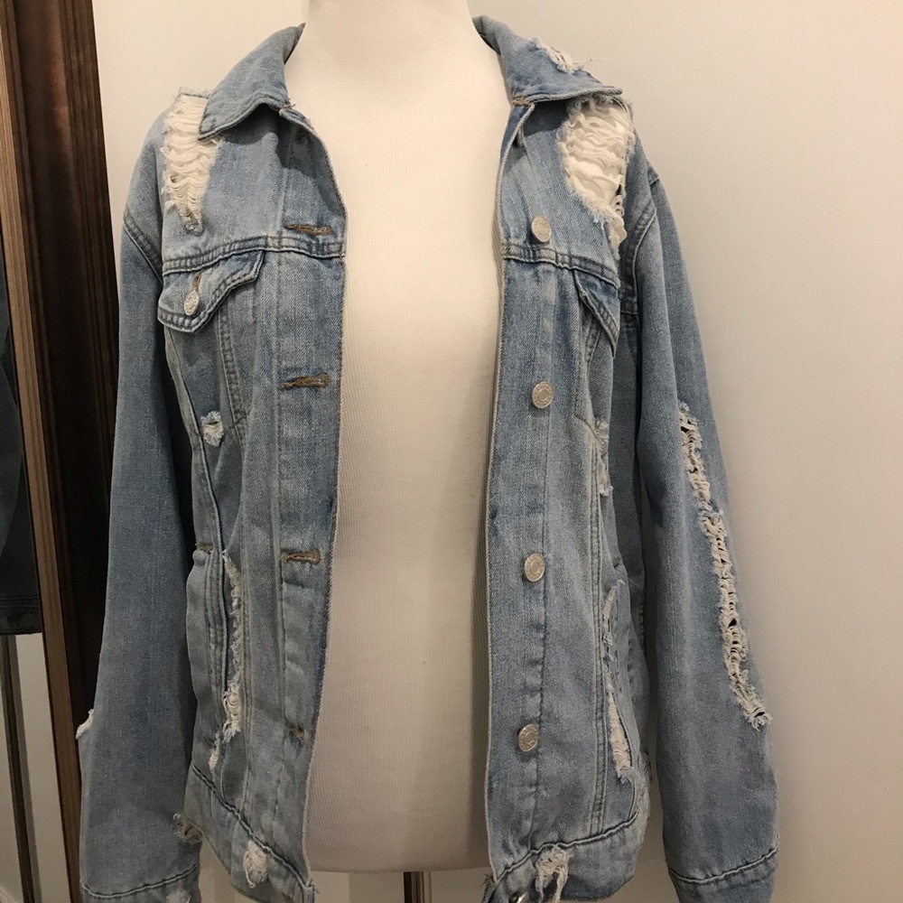 Distressed denim jacket